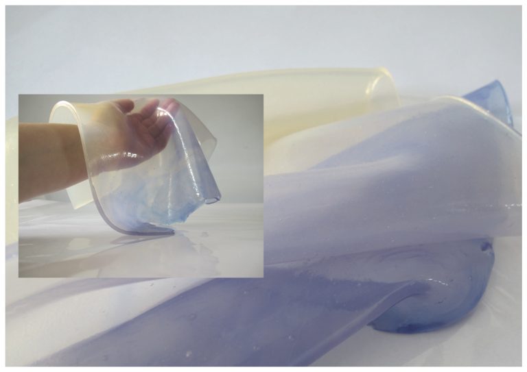MA Textile Design work by Jessica Read showing a soft semi-opaque bioplastic draped over an arm.