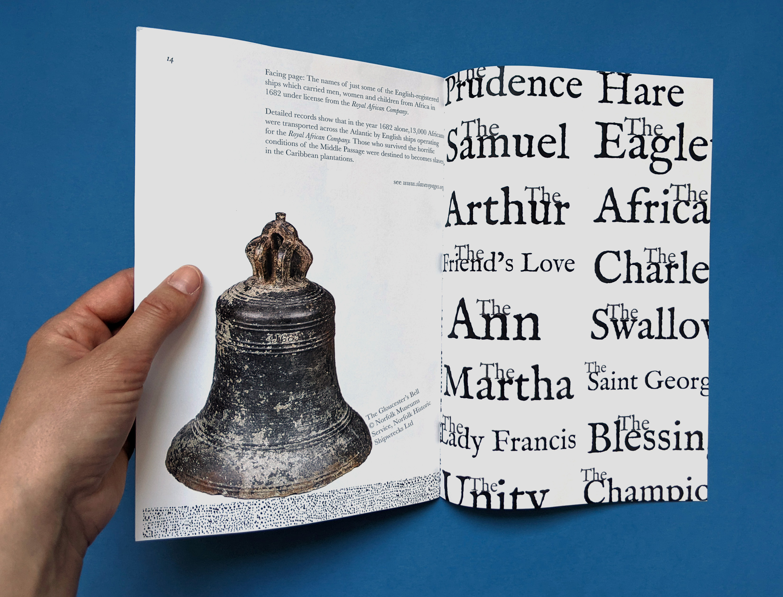 An A6 zine is open to the final double page spread, which shows a photograph of the original ship’s bell recovered from the Gloucester shipwreck opposite the names of ships operated by the Royal African Company in the year the ship sank.