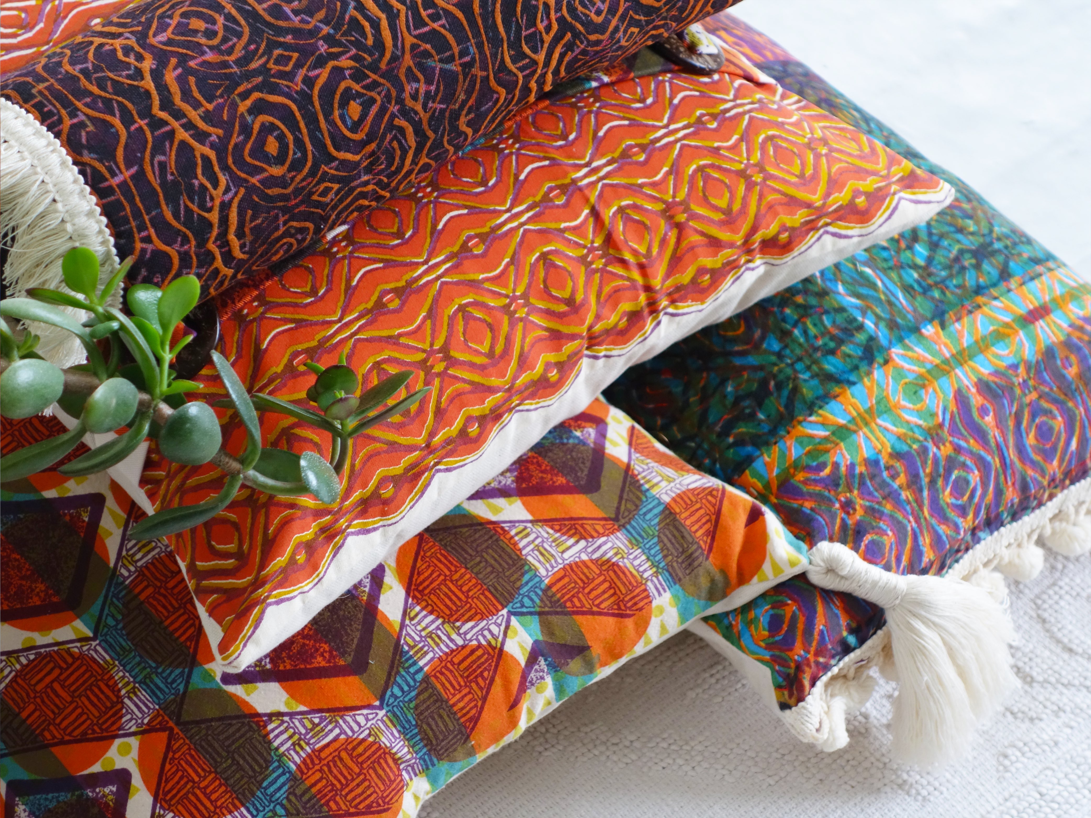MA Textile Design work by Marna Alberts showing a collection of interior cushions in various colour and pattern.